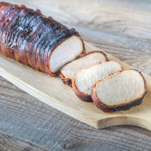 Pork loin wrapped in bacon