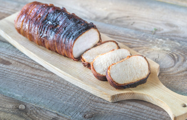 Pork loin wrapped in bacon