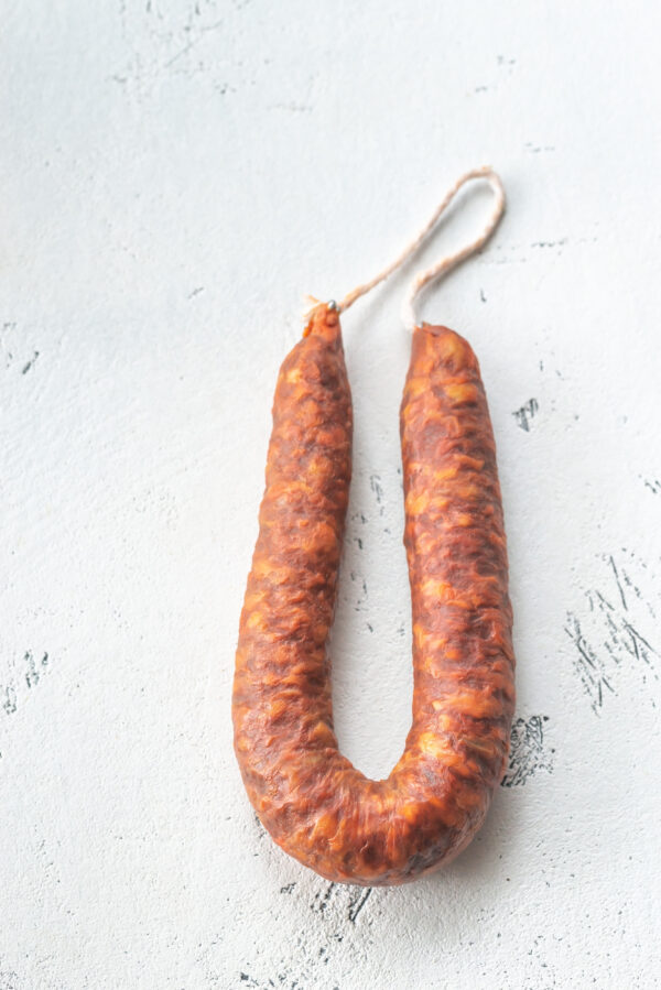 Spanish chorizo on the white background
